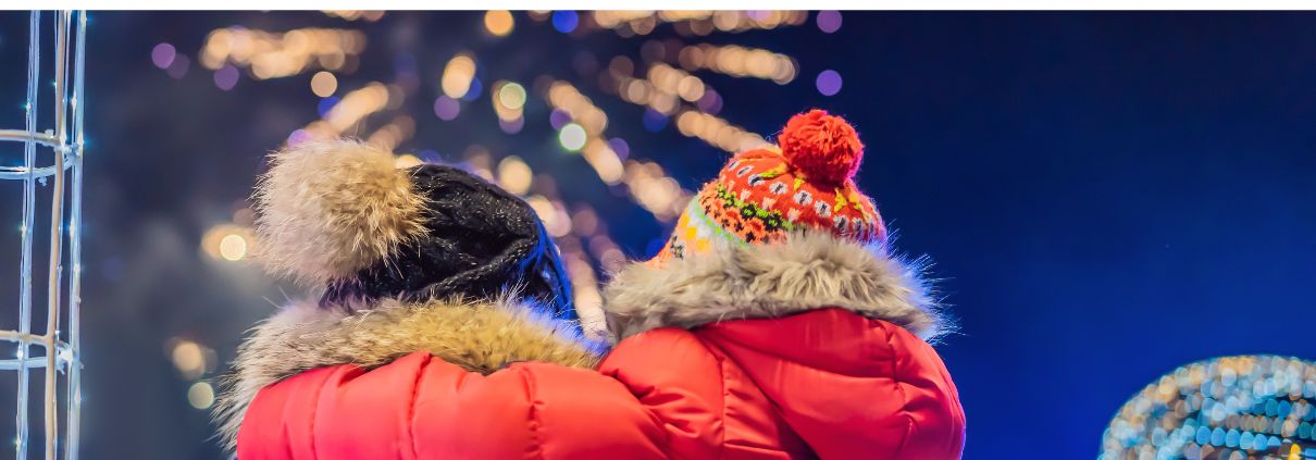 New Year in Swedish Lapland New Year in Swedish Lapland: A family dressed in winter clothing enjoys dazzling fireworks in the snowy Arctic landscape.